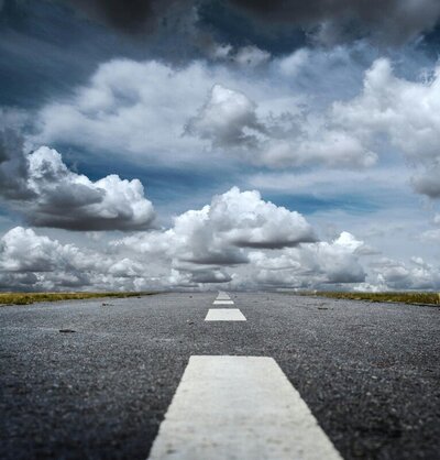 Photo by Pixabay: https://www.pexels.com/photo/gray-rolled-asphalt-road-under-cloudy-sky-52531/